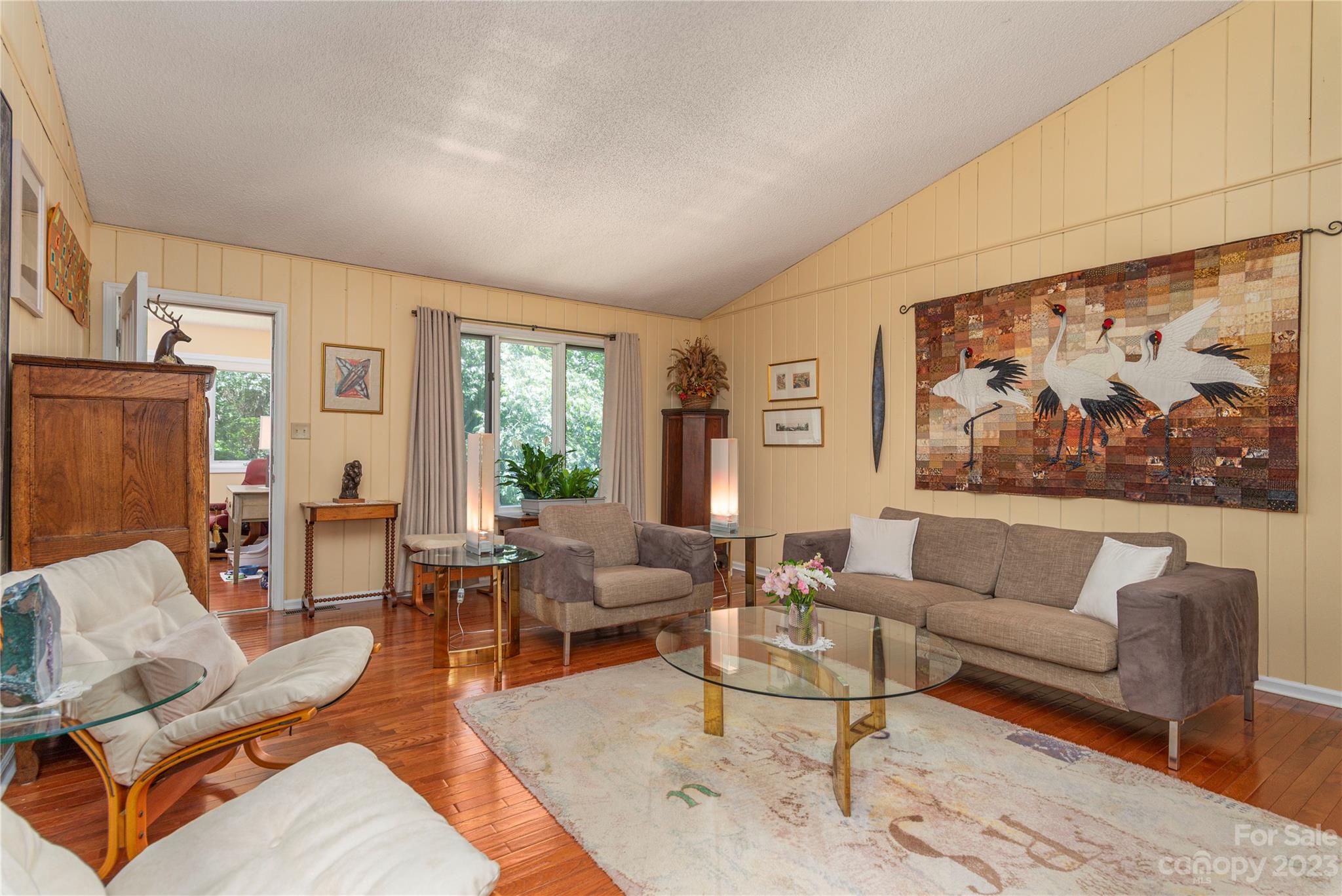 6 Cambridge Road Asheville, NC 28804 - Photo 4 of 35 a living room with furniture and a large window