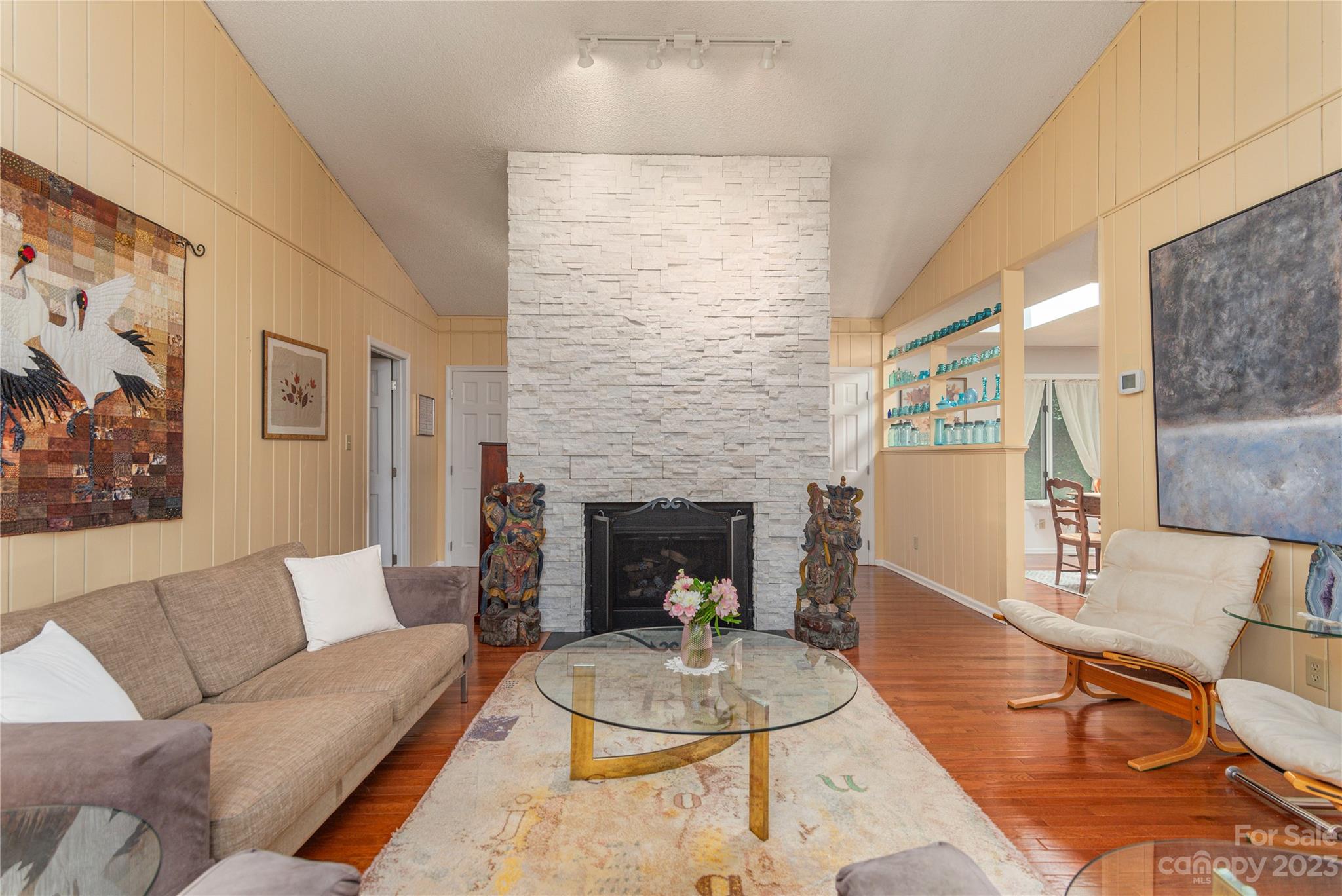 6 Cambridge Road Asheville, NC 28804 - Photo 5 of 35 a living room with furniture and a fireplace
