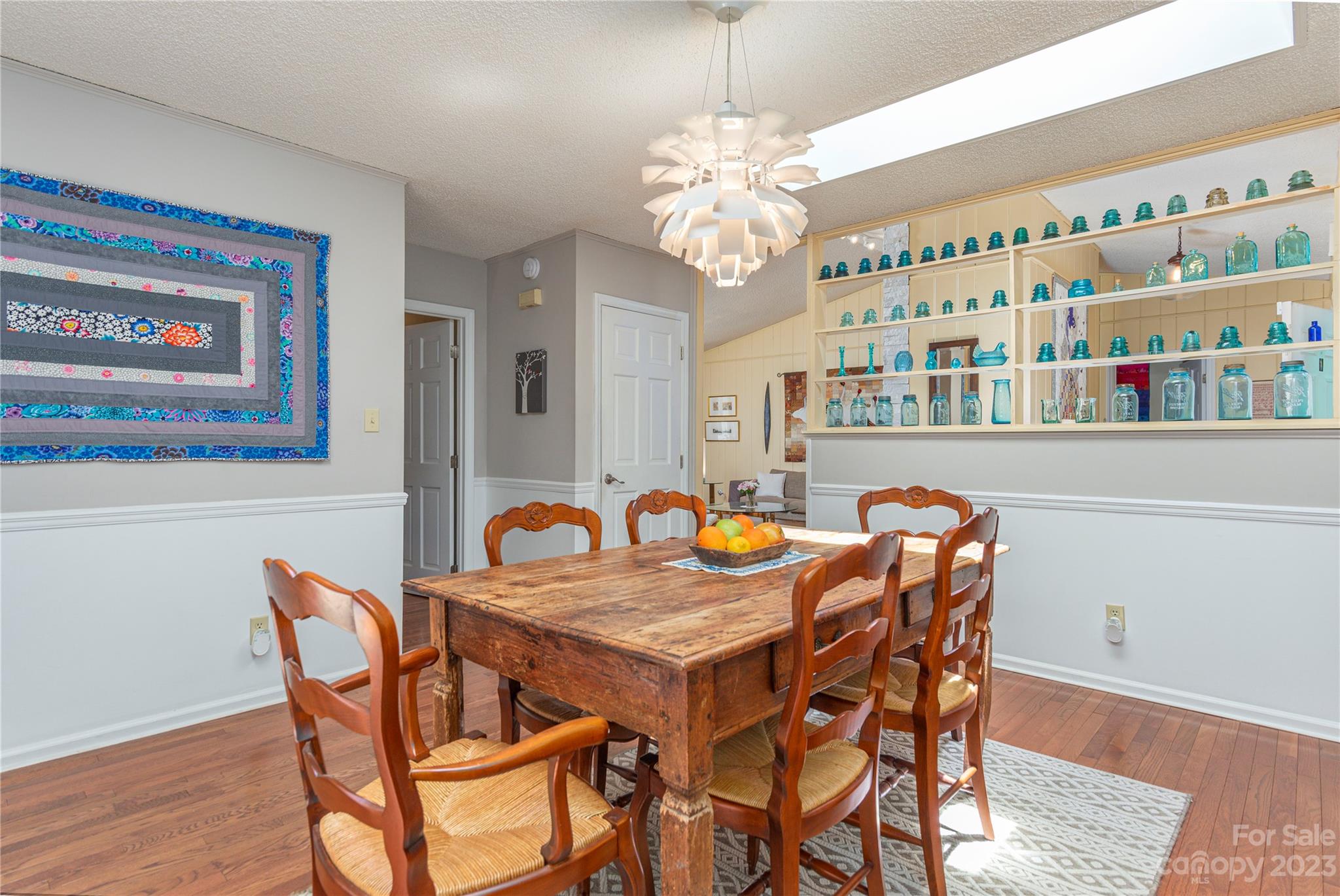 6 Cambridge Road Asheville, NC 28804 - Photo 7 of 35 a view of a dining room with furniture and chandelier
