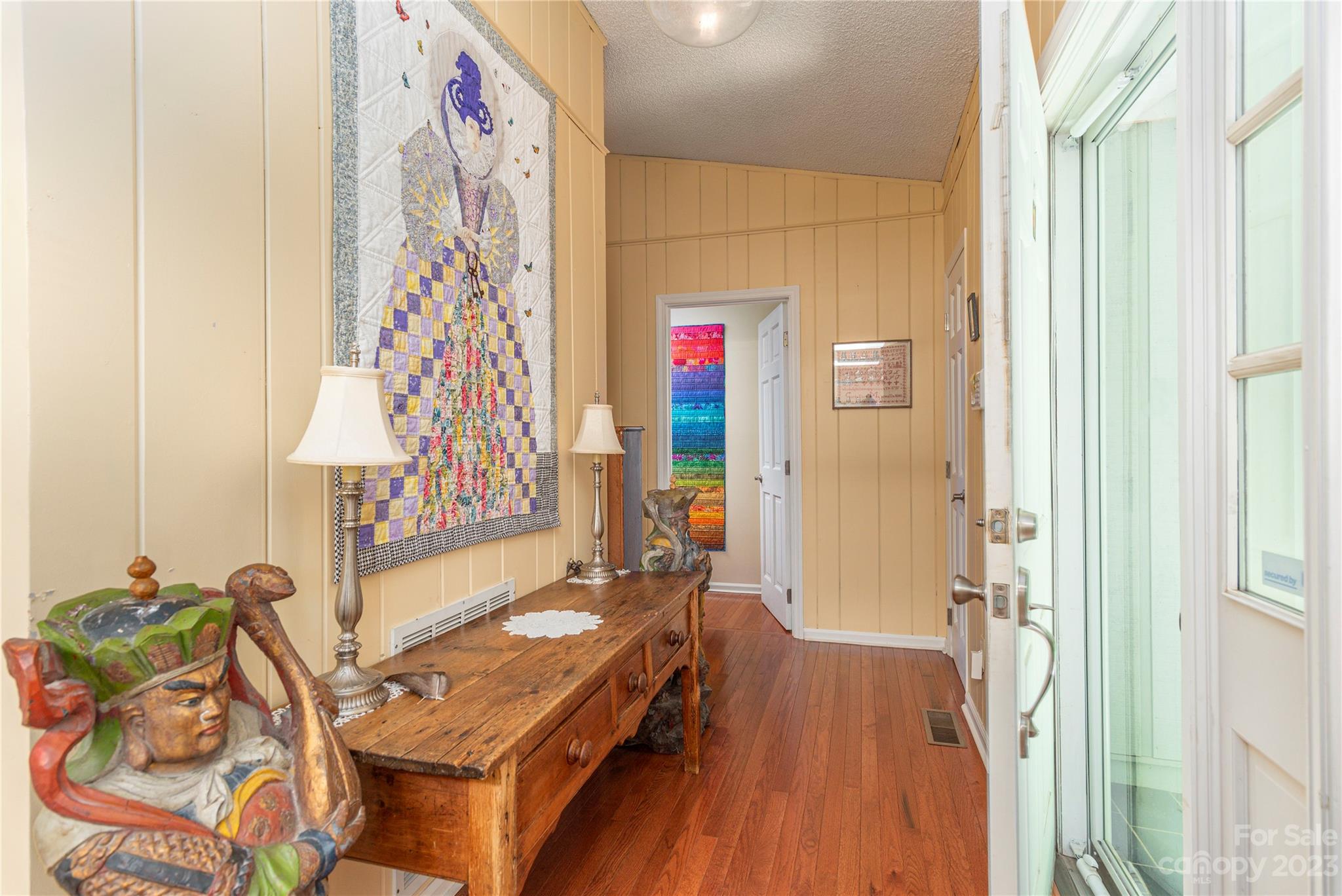 6 Cambridge Road Asheville, NC 28804 - Photo 9 of 35 a room with furniture and a wooden floor