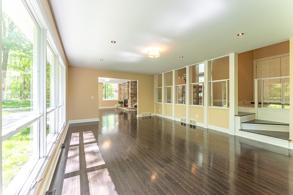 220 Hibiscus Drive Rochester, NY 14618 - Photo 21 of 50 The interplay of levels and light creates a striking, loft-like openness you can feel.