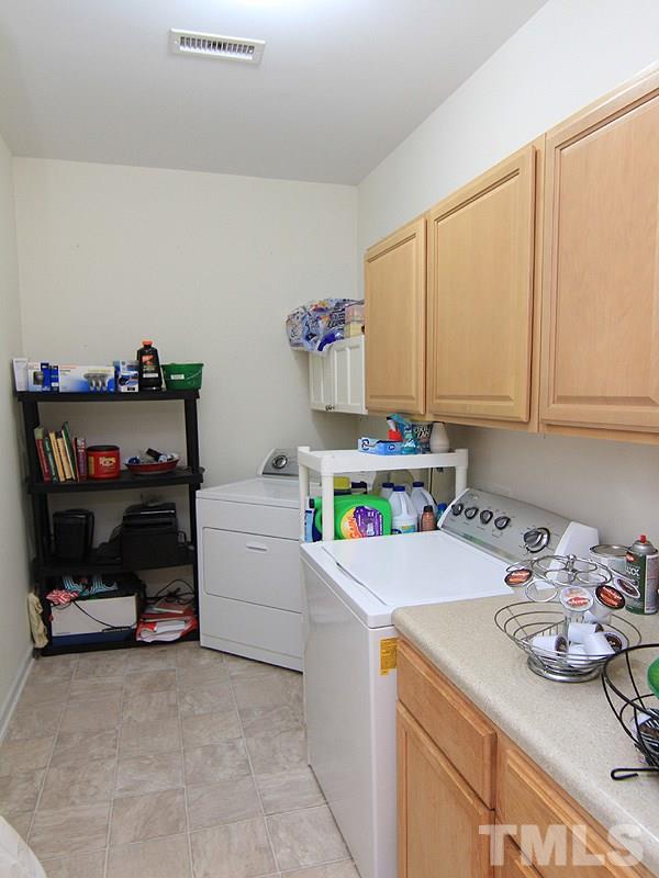 3505 Pinkham Way Raleigh, NC 27616 - Photo 12 of 24 a utility room with sink dryer and washer