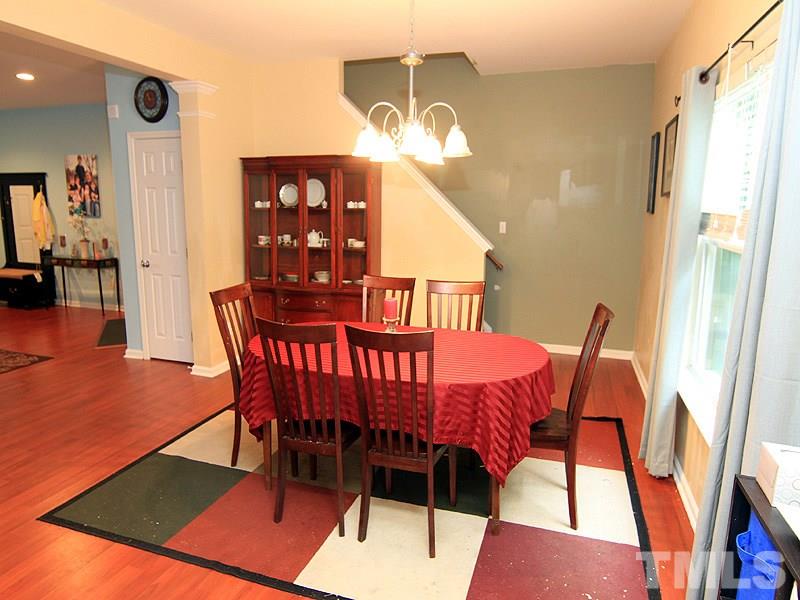 3505 Pinkham Way Raleigh, NC 27616 - Photo 8 of 24 a view of a dining room with furniture and wooden floor