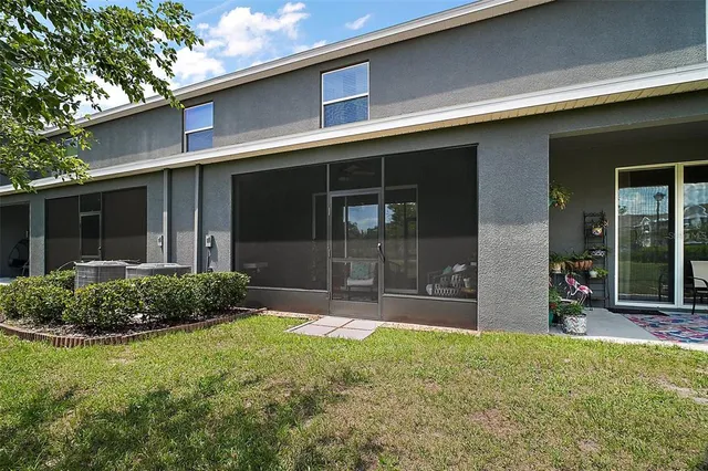 a view of a backyard of the house