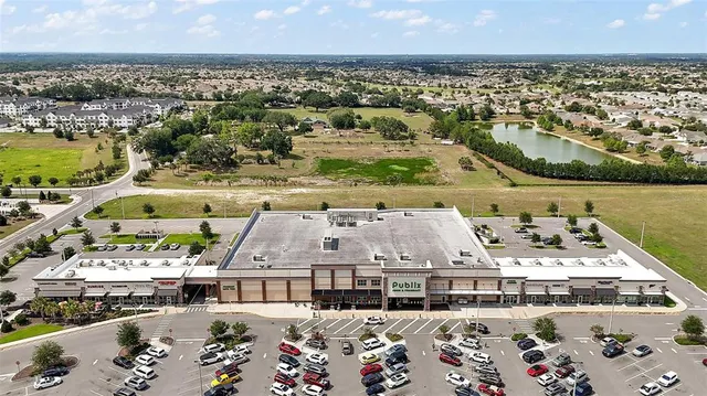 an aerial view of a house with a garden