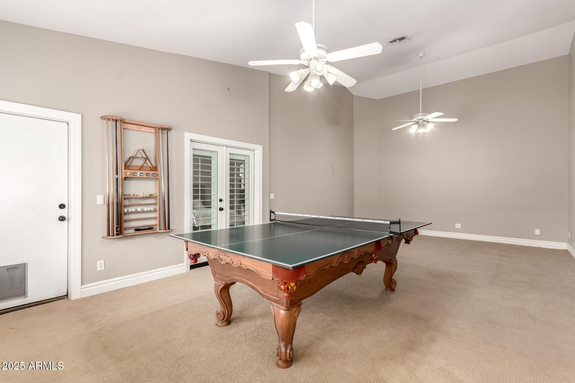 3528 East Decatur Street Mesa, AZ 85213 - Photo 19 of 55 a room with pool table and windows