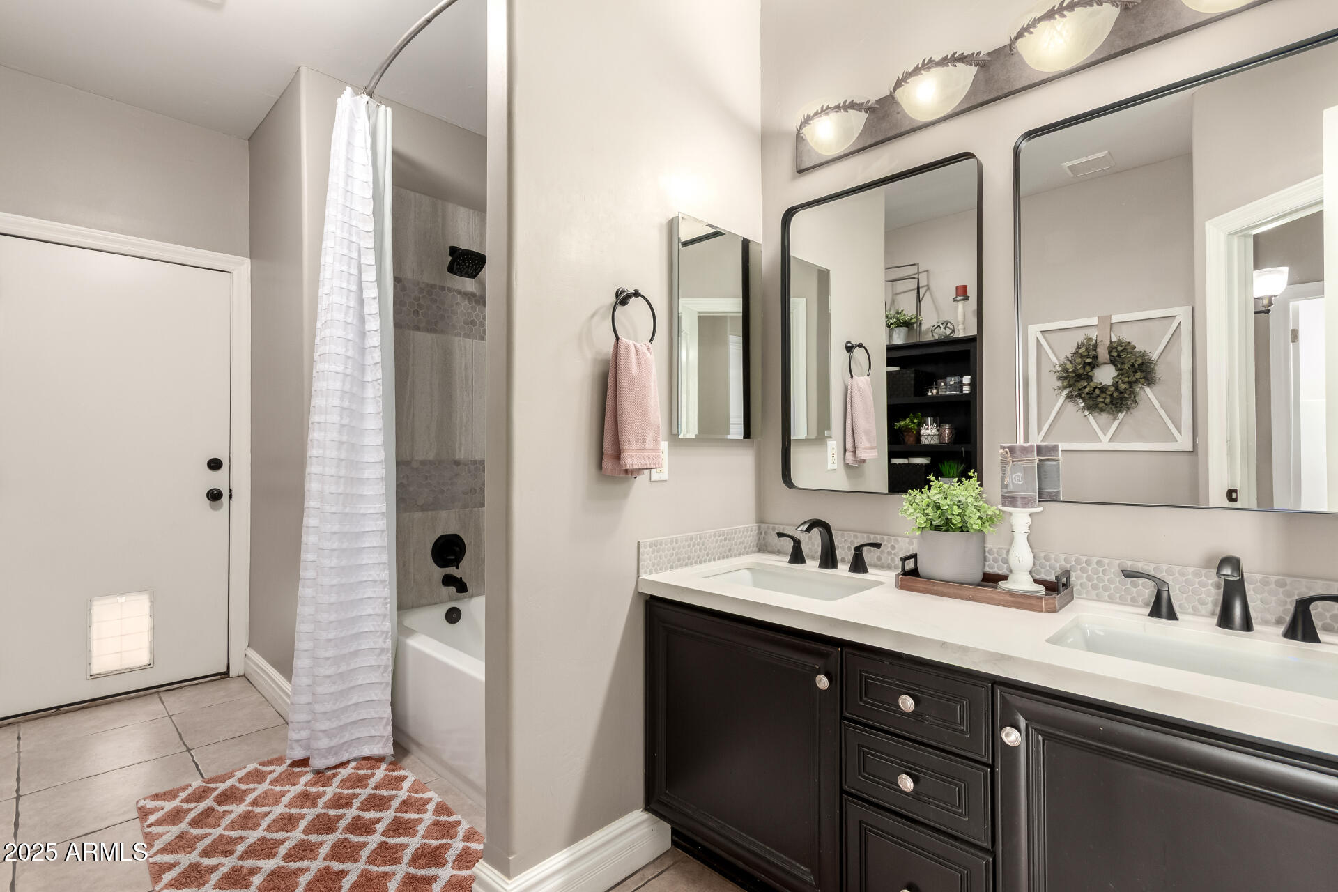 3528 East Decatur Street Mesa, AZ 85213 - Photo 31 of 55 a bathroom with a sink a toilet and shower