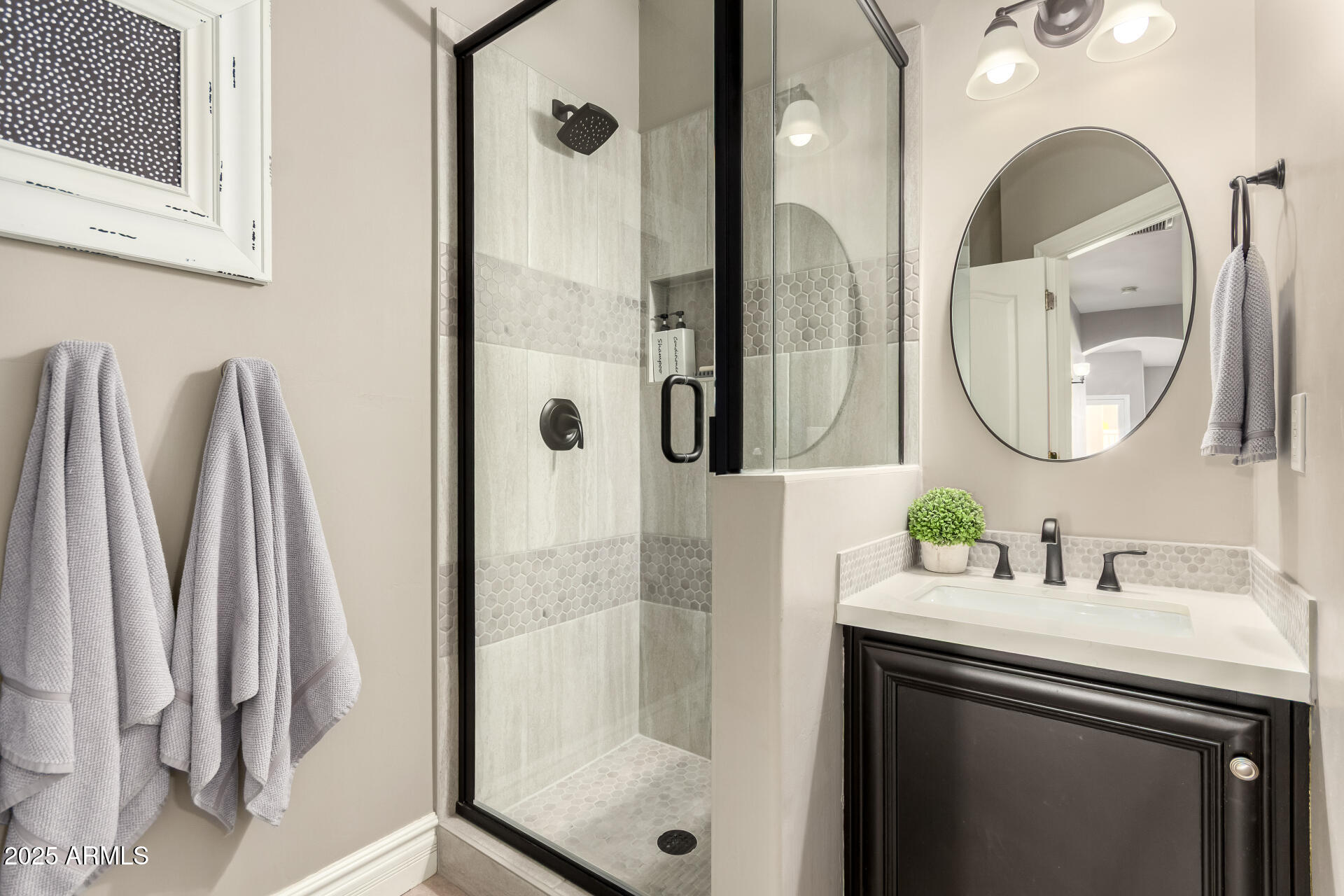 3528 East Decatur Street Mesa, AZ 85213 - Photo 37 of 55 a bathroom with a double vanity sink mirror and shower