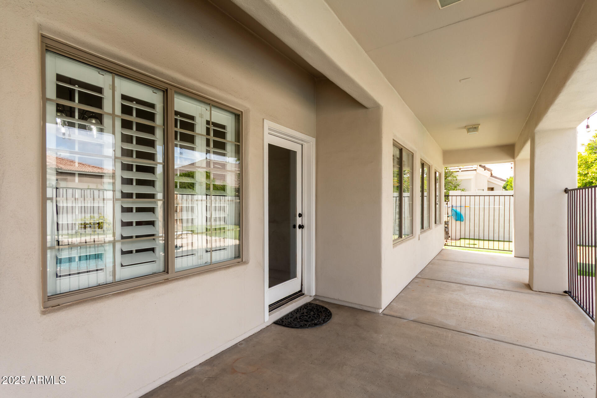 3528 East Decatur Street Mesa, AZ 85213 - Photo 39 of 55 a view of an entryway with wooden floor
