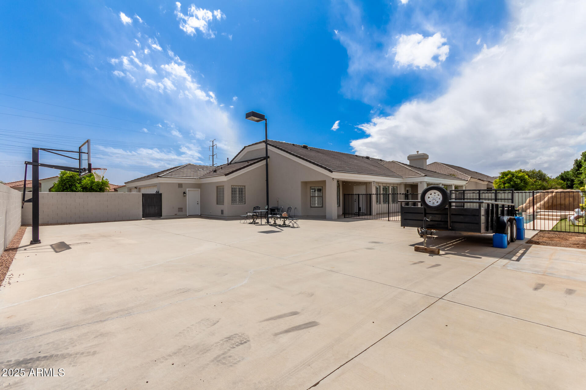 3528 East Decatur Street Mesa, AZ 85213 - Photo 44 of 55 a view of a house with a snow in the yard