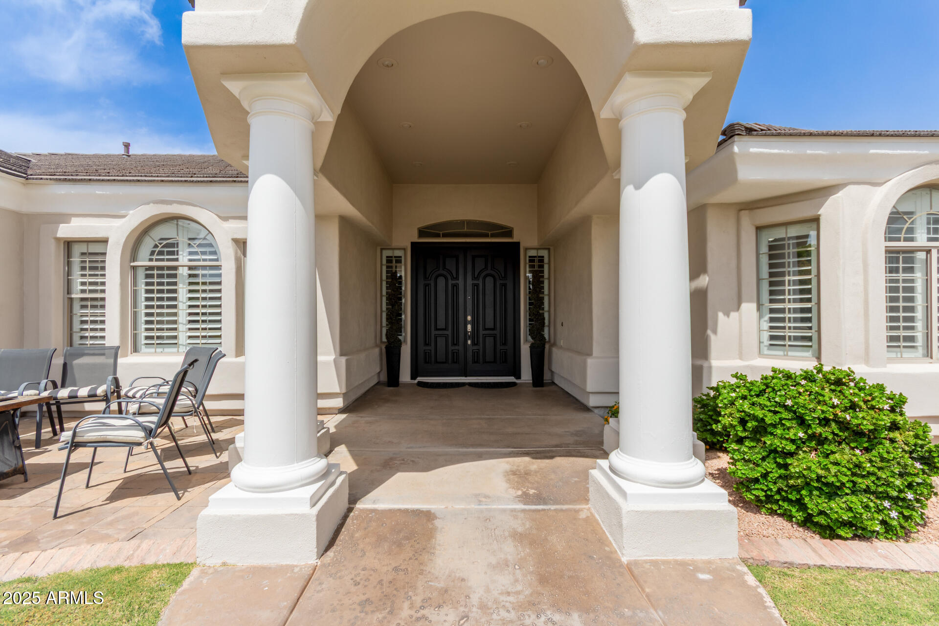 3528 East Decatur Street Mesa, AZ 85213 - Photo 5 of 55 a front view of a house with outdoor seating