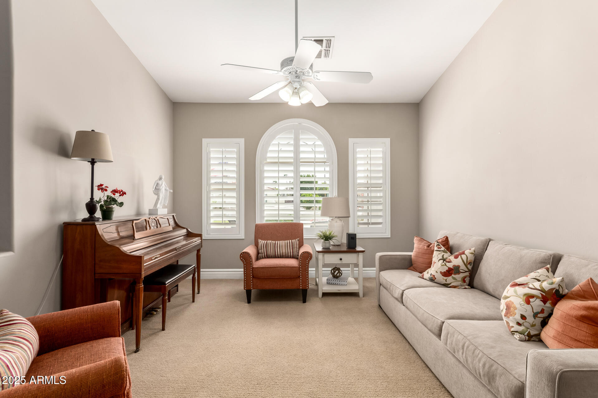 3528 East Decatur Street Mesa, AZ 85213 - Photo 8 of 55 a living room with furniture and a large window