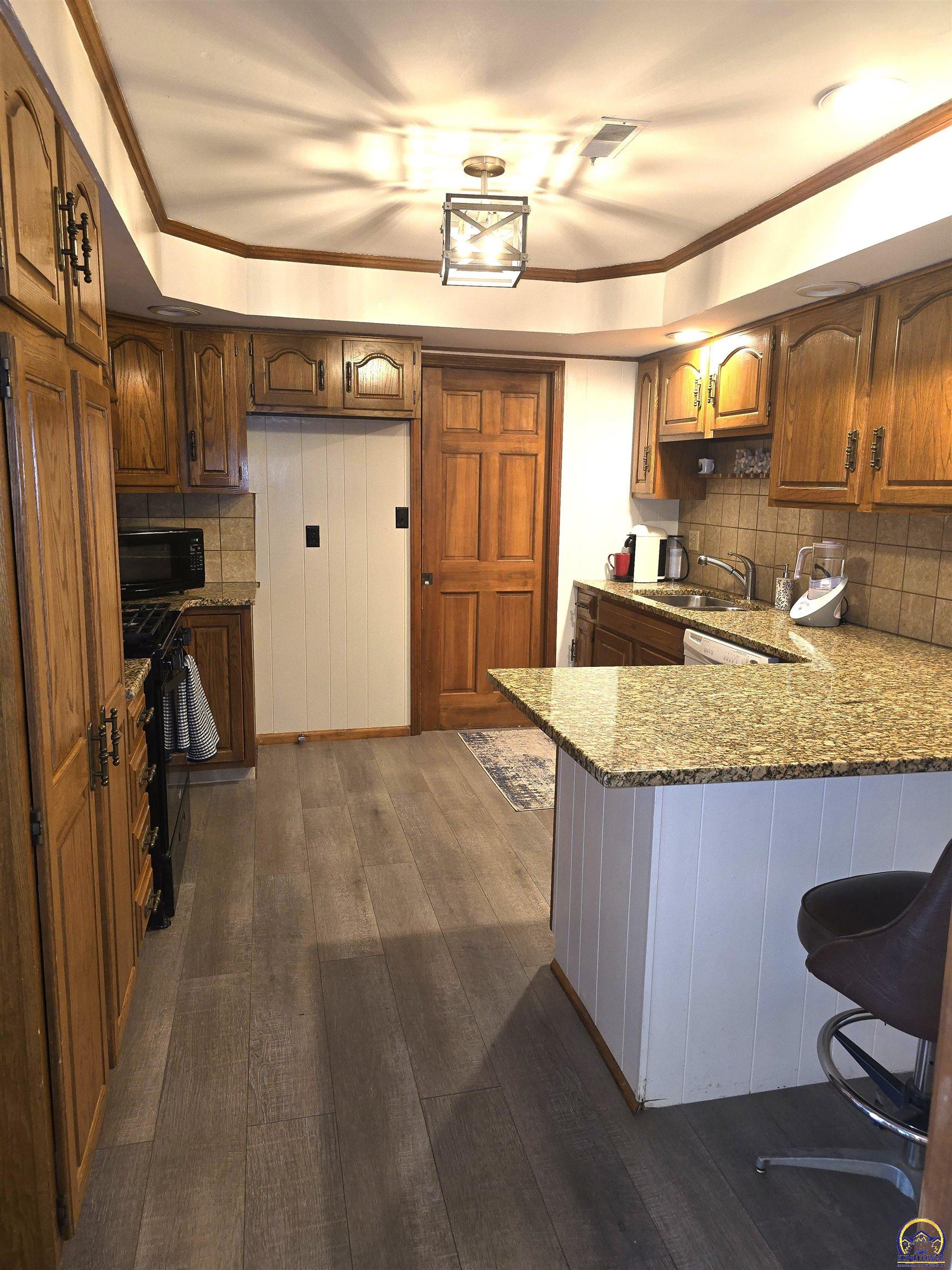 6257 West Lake Road Meriden, KS 66512 - Photo 47 of 77 Lower Level Kitchen