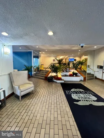 a view of a living room and dining room