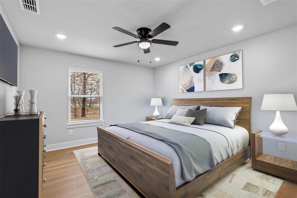 472 Peace Lily Way Tolar, TX 76476 - Photo 2 of 40 a spacious bedroom with a bed and a window