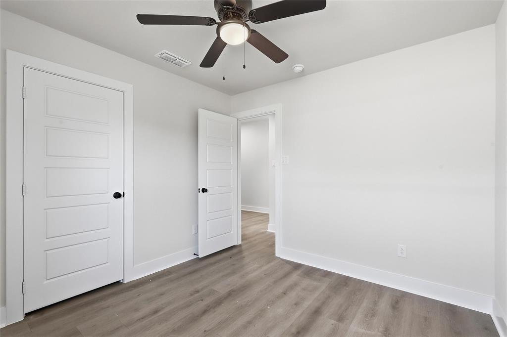 472 Peace Lily Way Tolar, TX 76476 - Photo 28 of 40 wooden floor in an empty room