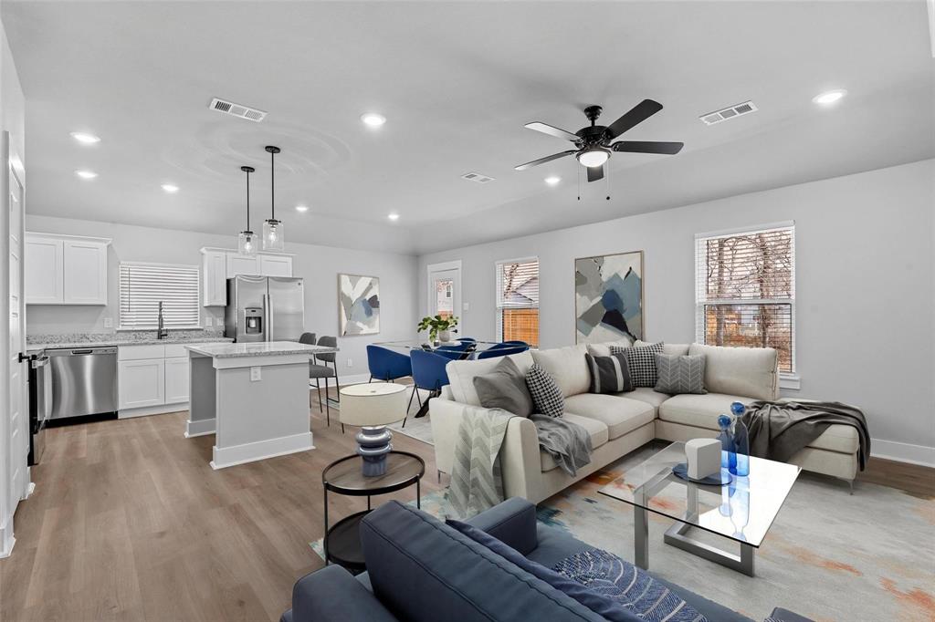 472 Peace Lily Way Tolar, TX 76476 - Photo 3 of 40 a living room with furniture and kitchen view