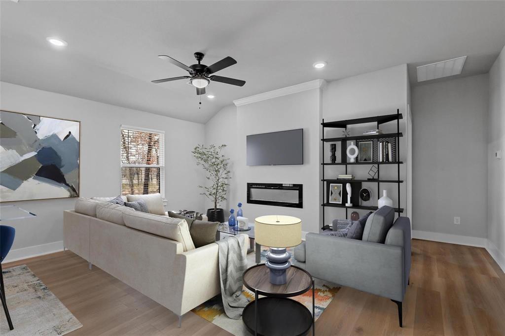 472 Peace Lily Way Tolar, TX 76476 - Photo 4 of 40 a living room with furniture a rug and a ceiling fan