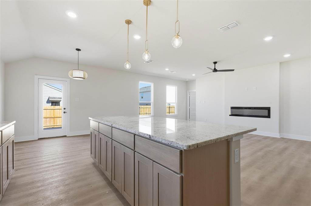 472 Peace Lily Way Tolar, TX 76476 - Photo 10 of 40 a kitchen with counter top space and sink