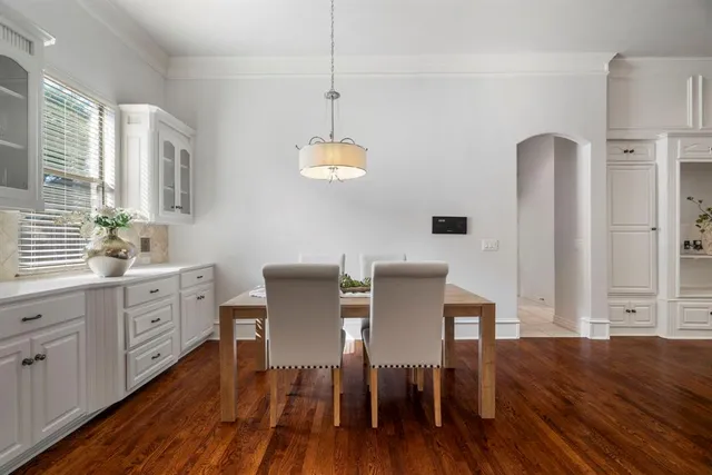 a view of dining room and wooden floor