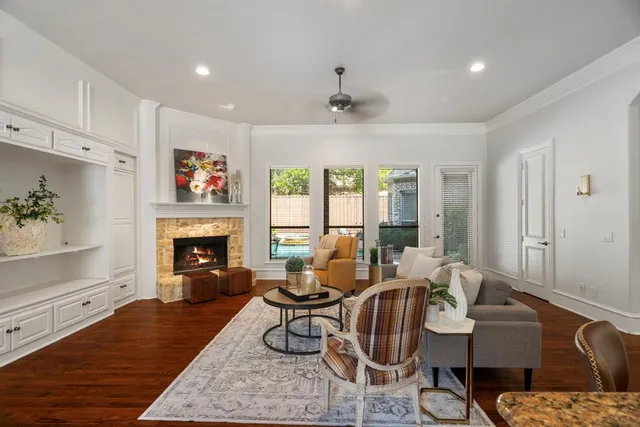 a living room with furniture or couch and a fireplace