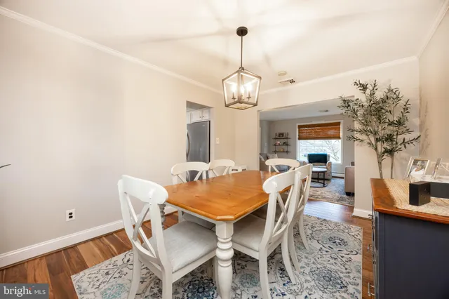 a bedroom with a bed and a desk