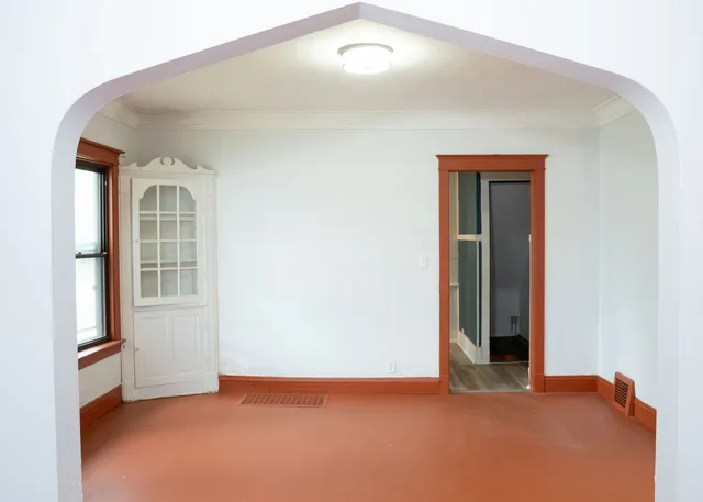 an empty room with windows