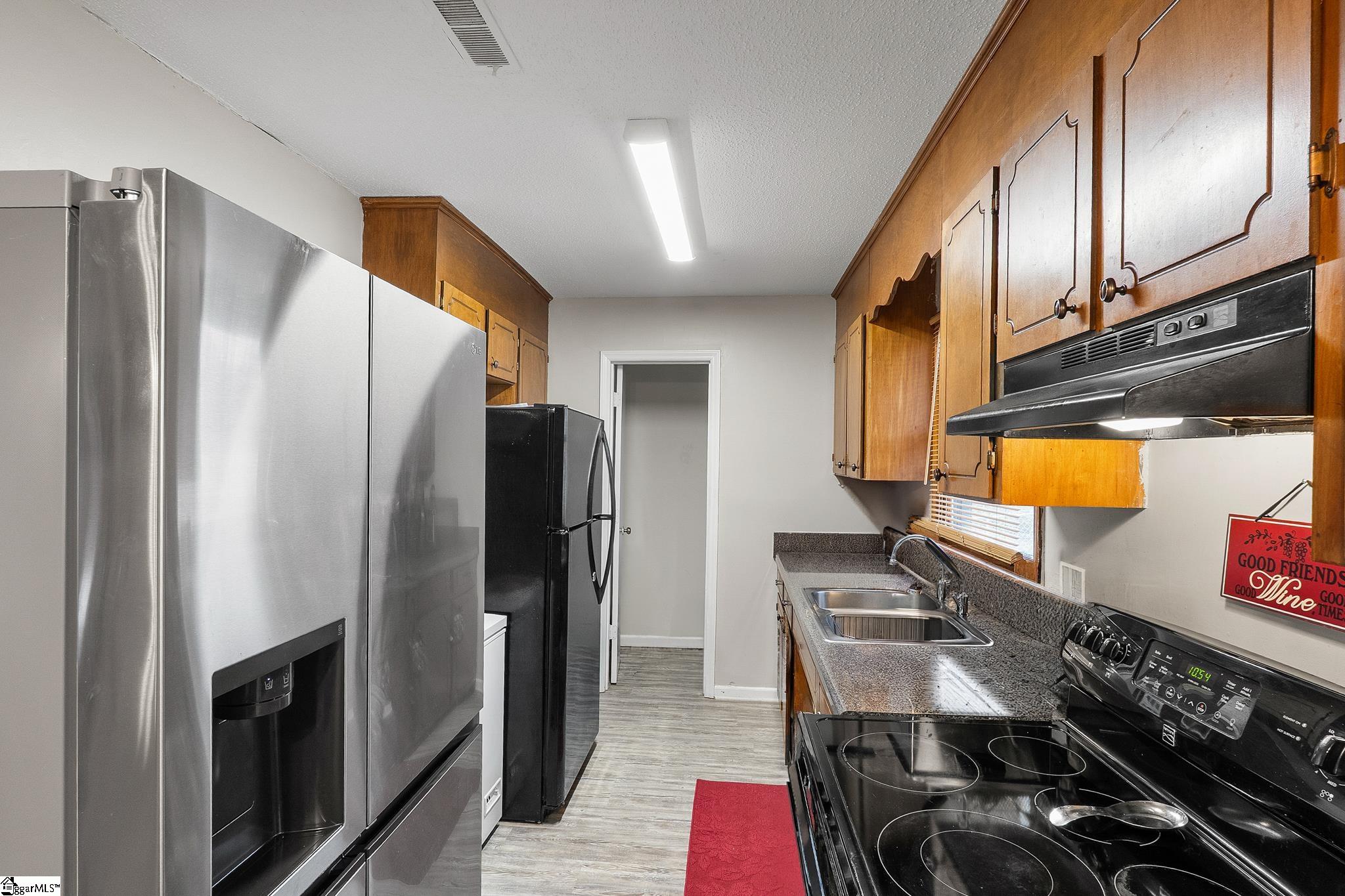 108 Everest Drive Inman, SC 29349 - Photo 7 of 21 Counterspace virtually cleaned.