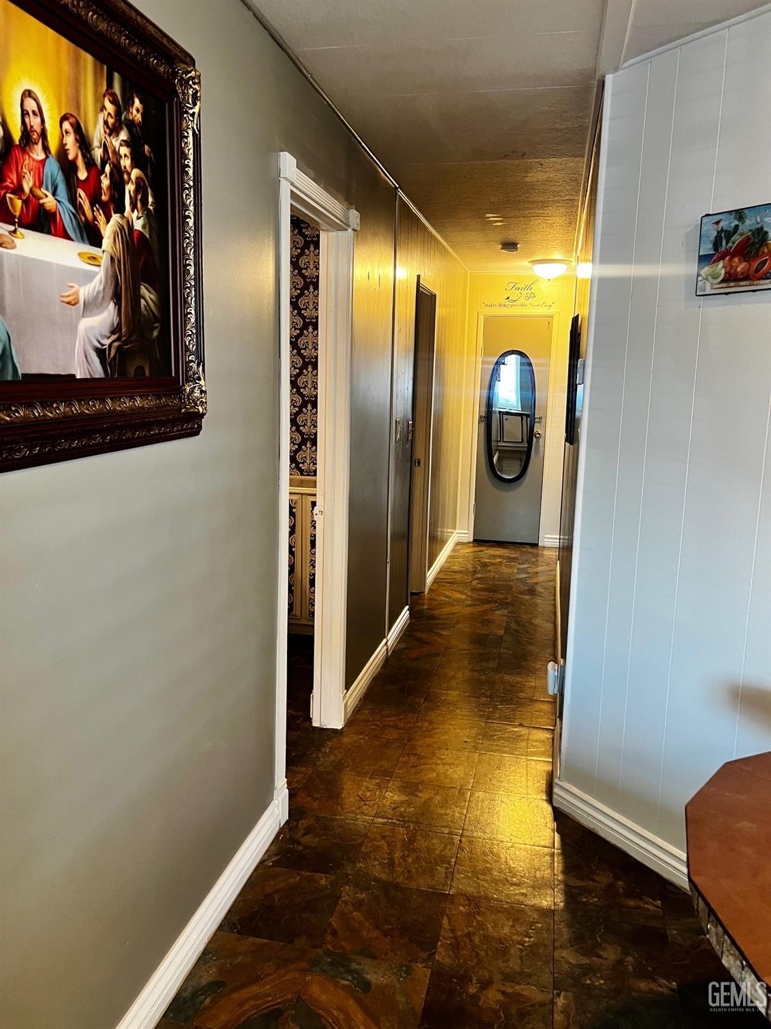 Undisclosed Address Bakersfield, CA 93306 - Photo 5 of 9 a view of gallery with wooden floor