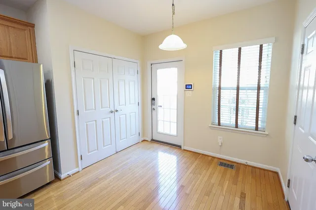 a bathroom with a shower and a sink