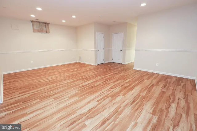 a view of a big room with carpet