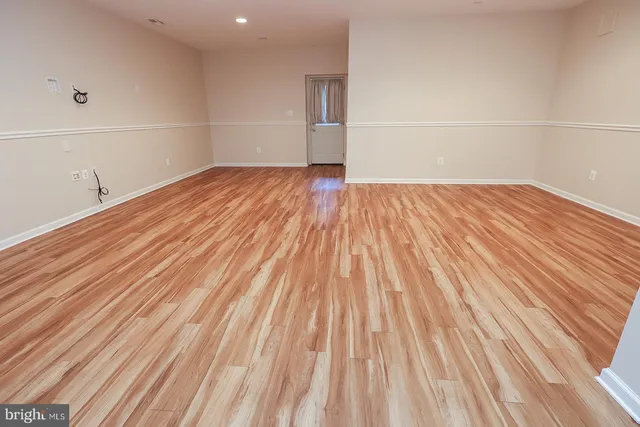 a view of a big room with carpet