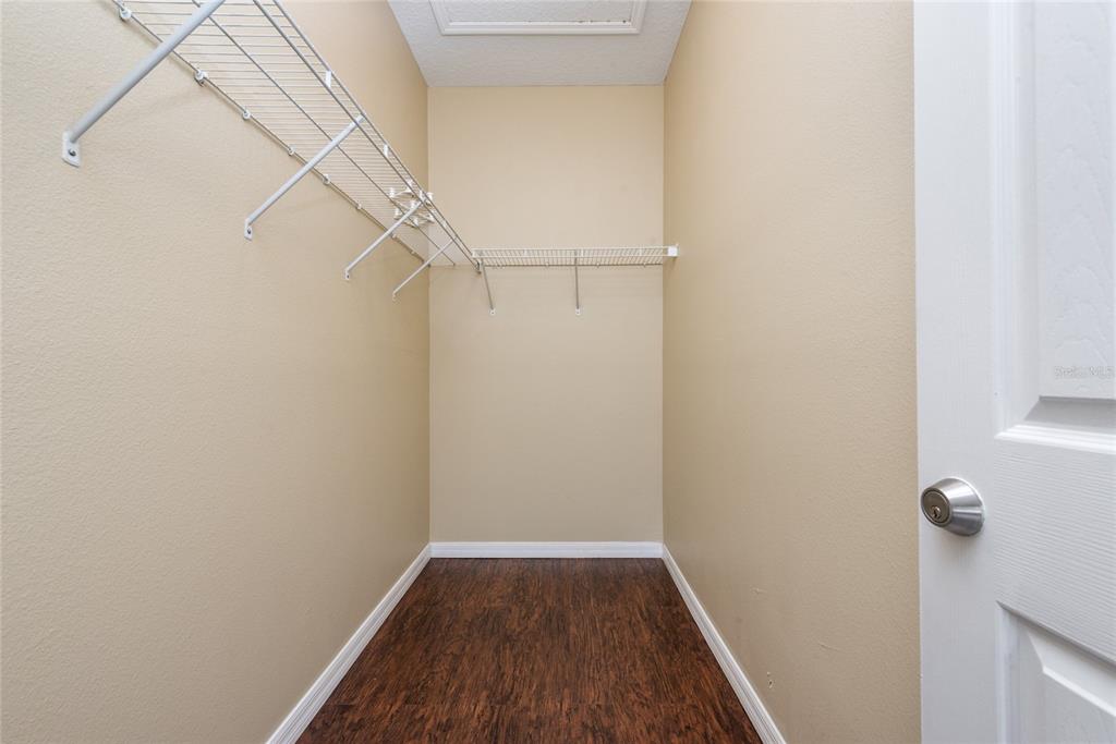 7531 Pellham Way, Unit 77 Kissimmee, FL 34747 - Photo 14 of 28 a view of a room with racks on the wall