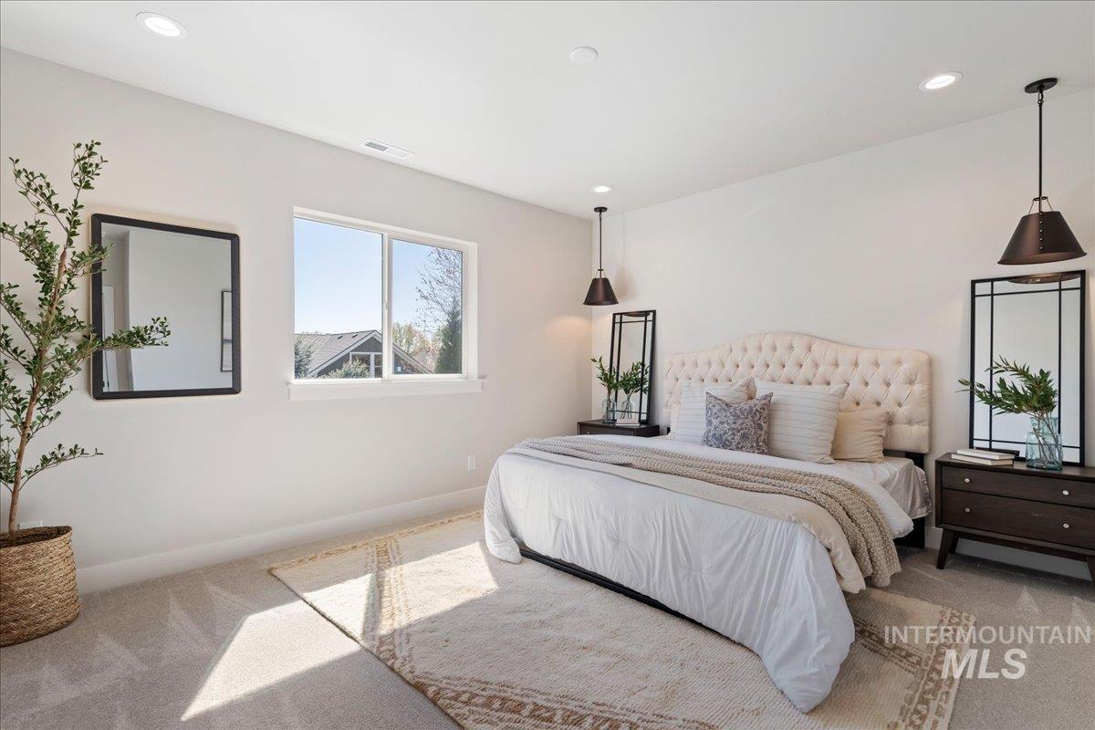 901 West Malbar Street Meridian, ID 83646 - Photo 13 of 33 Bedroom featuring light carpet and recessed lighting