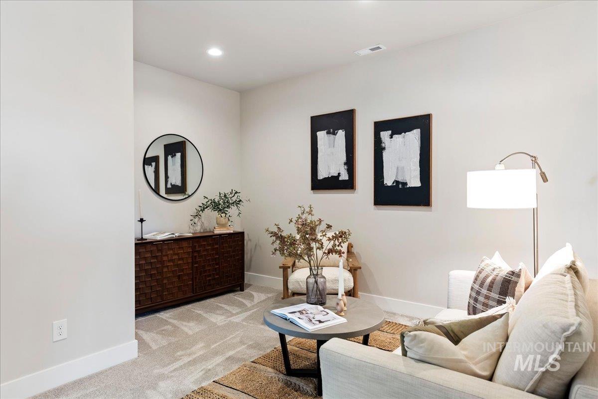 901 West Malbar Street Meridian, ID 83646 - Photo 18 of 33 Living area featuring carpet floors and recessed lighting
