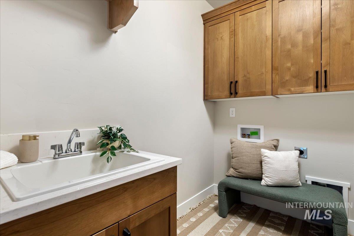 901 West Malbar Street Meridian, ID 83646 - Photo 27 of 33 Laundry area featuring hookup for a washing machine and cabinet space