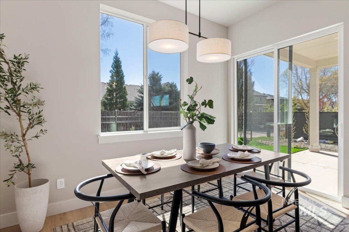 901 West Malbar Street Meridian, ID 83646 - Photo 9 of 33 Dining room with light wood-type flooring and baseboards