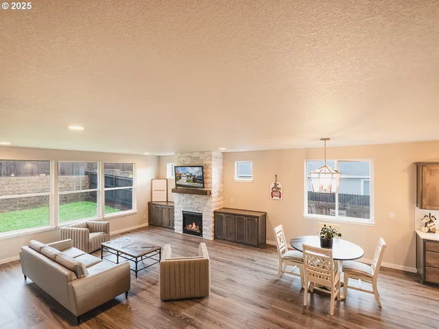 a living room with furniture and a table