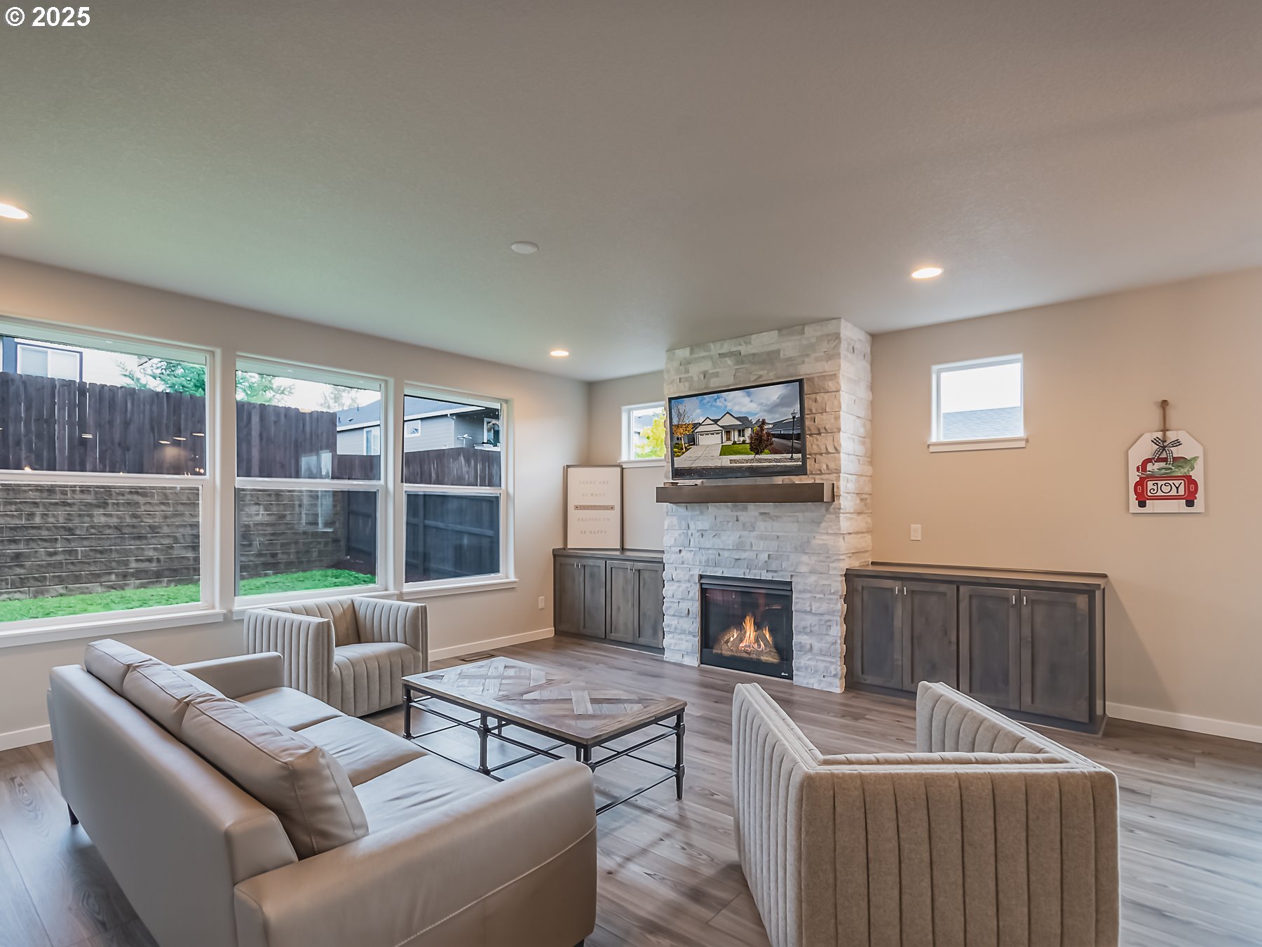 2116 North 3rd Way Ridgefield, WA 98642 - Photo 20 of 40 a living room with furniture and a fireplace