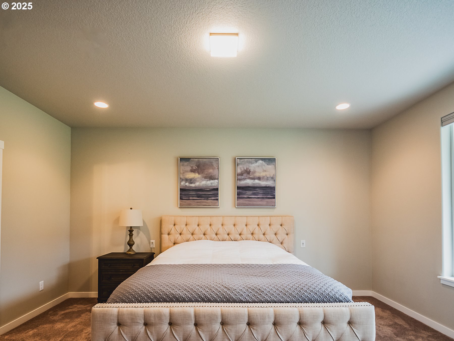 2116 North 3rd Way Ridgefield, WA 98642 - Photo 24 of 40 a bedroom with a bed and a window