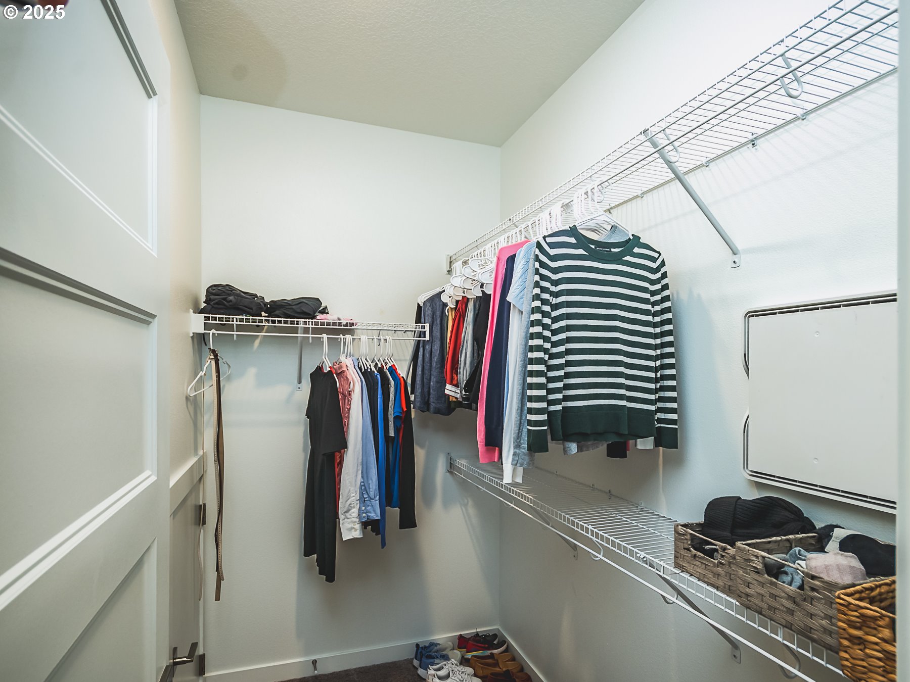 2116 North 3rd Way Ridgefield, WA 98642 - Photo 30 of 40 a view of walk in closet with clothes and shoes