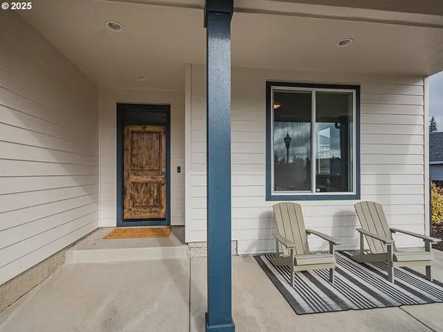 a view of a house with a lounge chair