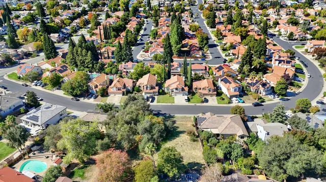 a childrens park with lots of swings and slides