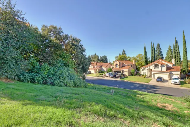 a view of swimming pool from a garden