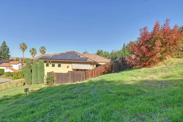 a view of a town with palm trees and buildings