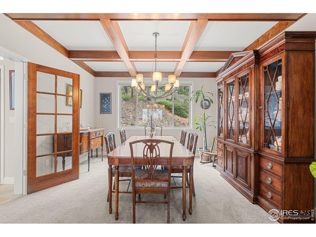 309 Sunrise Lane Boulder, CO 80302 - Photo 12 of 40 a view of a dining room with furniture window and outside view
