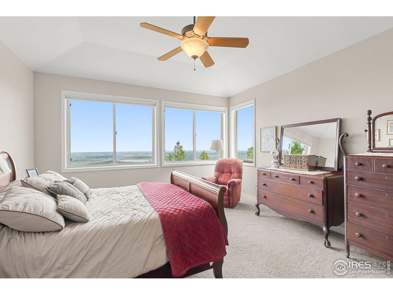 309 Sunrise Lane Boulder, CO 80302 - Photo 18 of 40 a bedroom with a bed and a window