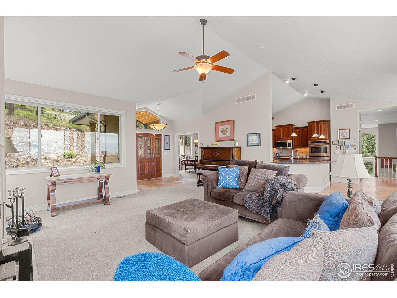 309 Sunrise Lane Boulder, CO 80302 - Photo 24 of 40 a living room with furniture and a large window