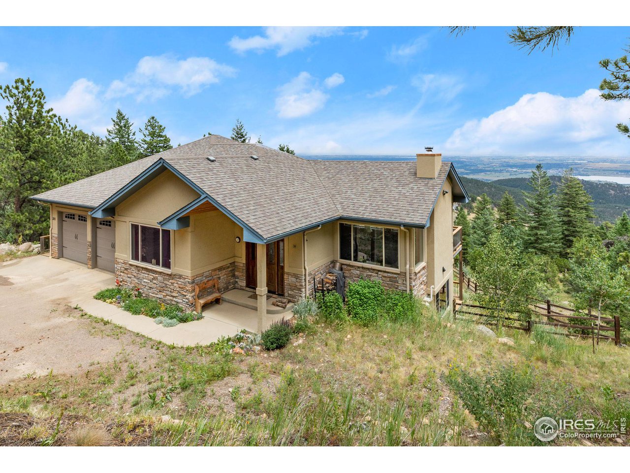 309 Sunrise Lane Boulder, CO 80302 - Photo 25 of 40 a house view with a garden space