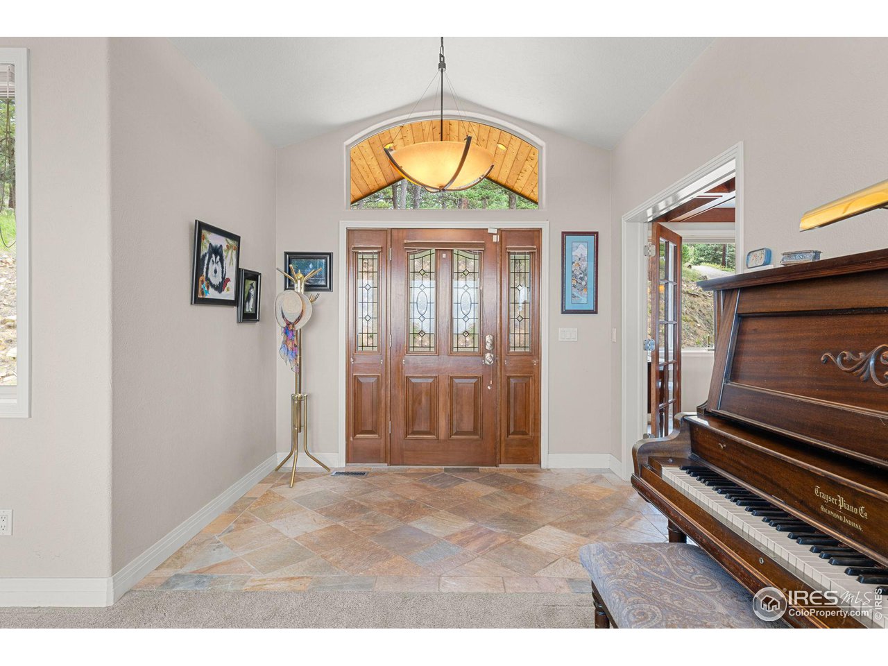 309 Sunrise Lane Boulder, CO 80302 - Photo 30 of 40 a view of an entryway door with wooden floor